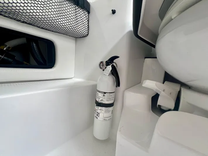  Yacht Photos Pics Fire extinguisher in 2025 Nor-Tech 340 Sport Center Console boat interior.