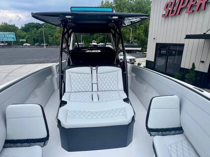  Yacht Photos Pics 2025 Nor-Tech 340 Sport Center Console boat with sleek seating and modern design.