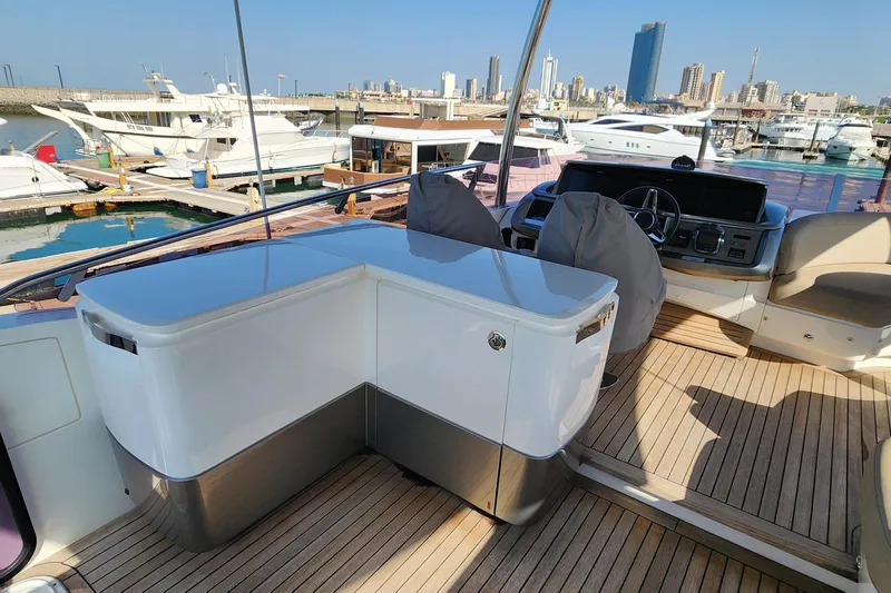  Yacht Photos Pics Luxurious 2019 Princess F62 yacht interior with modern helm and marina view.