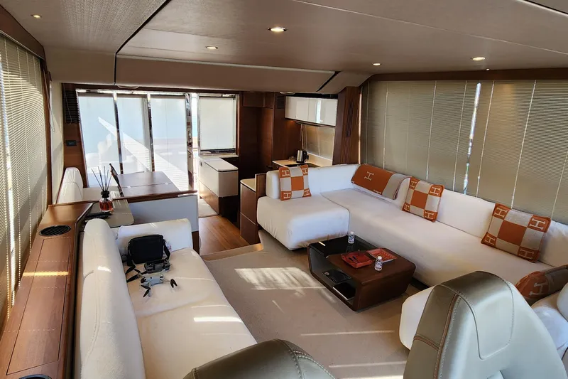  Yacht Photos Pics Luxurious interior of 2019 Princess F62 yacht with elegant seating and modern decor.