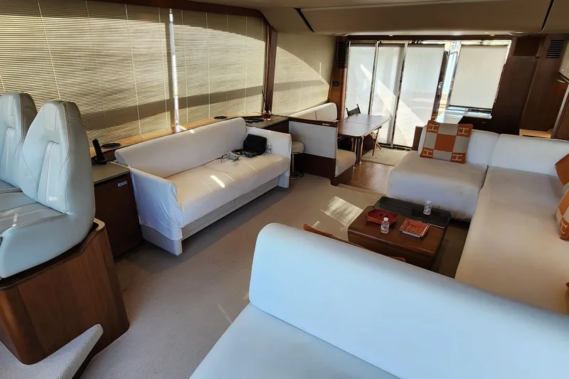  Yacht Photos Pics Luxurious interior of 2019 Princess F62 yacht with elegant seating and modern decor.