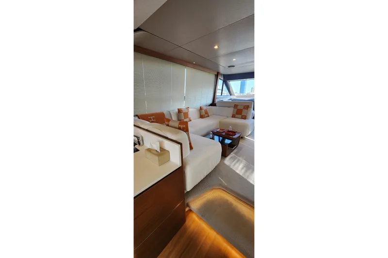  Yacht Photos Pics Luxurious interior of 2019 Princess F62 yacht with elegant seating and decor.