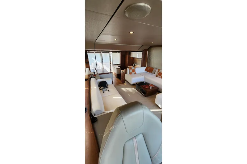  Yacht Photos Pics Luxurious interior of 2019 Princess F62 yacht with modern seating and decor.