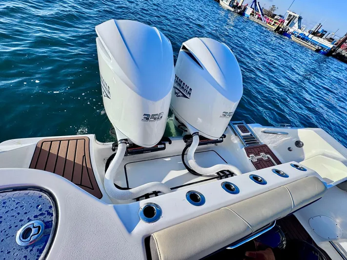 Suadha Yacht Photos Pics 2021 Tidewater 320 CC Adventure boat with twin Yamaha 350 engines on the water.