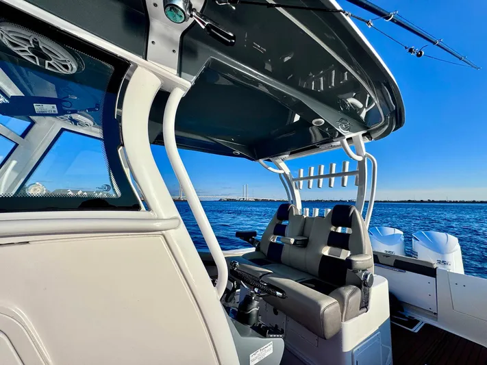 Suadha Yacht Photos Pics 2021 Tidewater 320 CC Adventure boat interior with ocean view.