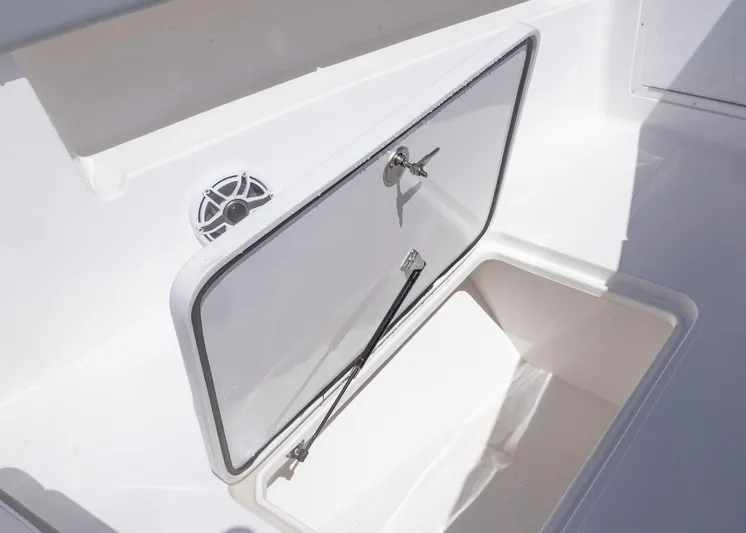  Yacht Photos Pics 2025 Streamline R 35 boat storage compartment with open hatch and speaker.