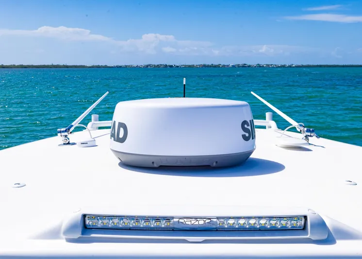  Yacht Photos Pics Bow of Streamline R 35 boat, 2025 model, with radar, on clear blue ocean.