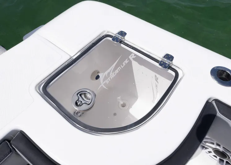  Yacht Photos Pics 2025 Streamline R 35 boat compartment with logo, featuring sleek design and secure latch.