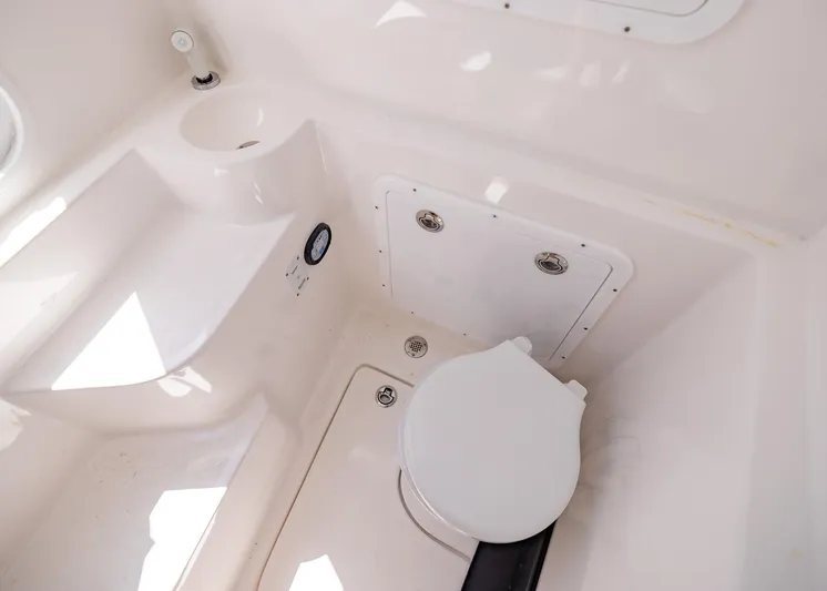  Yacht Photos Pics Compact bathroom in 2025 Streamline R 35 model, featuring a toilet and sink.
