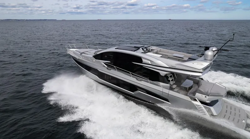  Yacht Photos Pics 2026 Galeon 700 Sky yacht cruising on open sea under clear skies.
