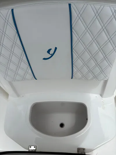  Yacht Photos Pics White boat seat with blue accents and diamond stitching, Young 27 model, 2019.