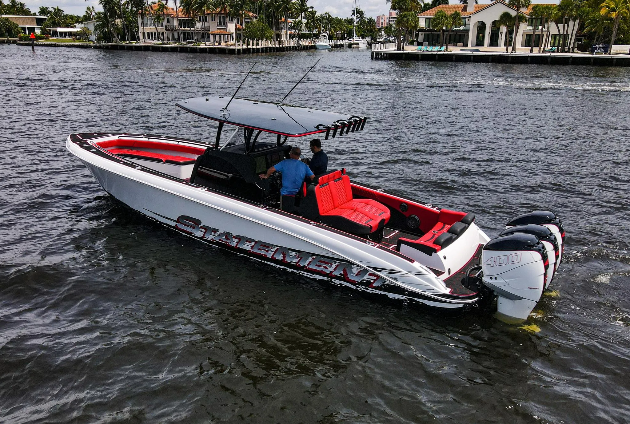 2020 Statement 380 Open boat on water with red interior.