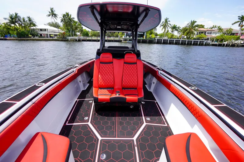  Yacht Photos Pics Luxurious 2020 Statement 380 Open boat with red seating on the water.