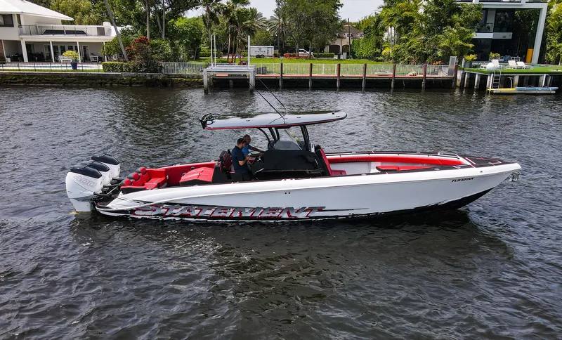  Yacht Photos Pics 2020 Statement 380 Open boat on a river.