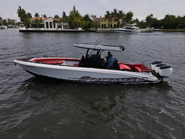  Yacht Photos Pics 2020 Statement 380 Open boat on calm water.