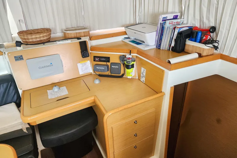 Myrto Yacht Photos Pics Navigation station in a 2012 Lagoon 400 catamaran with Garmin and Raymarine equipment.