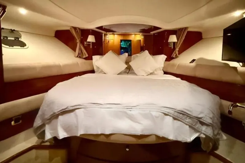  Yacht Photos Pics Luxurious cabin interior of 2005 Jeanneau Prestige 46 yacht with cozy bedding.