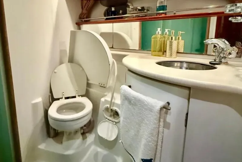  Yacht Photos Pics Bathroom interior of 2005 Jeanneau Prestige 46 yacht with toilet and sink.