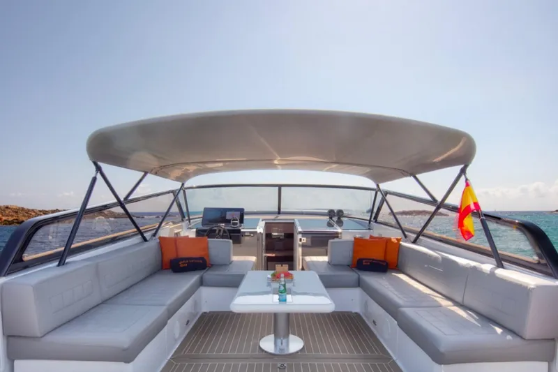 Sin Nombre Yacht Photos Pics Luxurious 2012 VanDutch 55 yacht interior with spacious seating and elegant design.