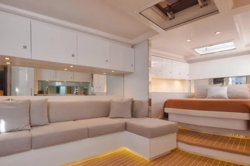Sin Nombre Yacht Photos Pics Luxurious interior of 2012 VanDutch 55 yacht with modern seating and elegant design.