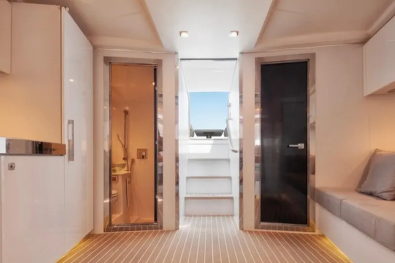 Sin Nombre Yacht Photos Pics Luxurious interior of 2012 VanDutch 55 yacht with modern design and elegant finishes.