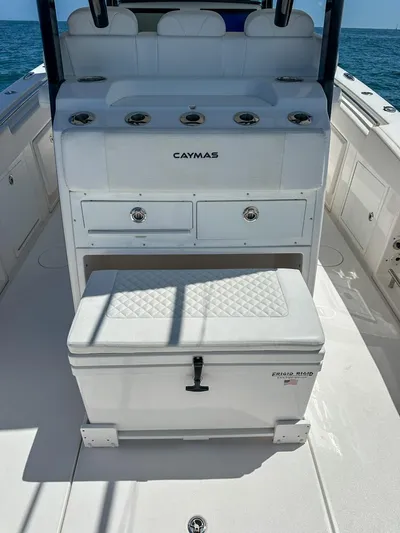  Yacht Photos Pics 2025 Caymas 341 CC boat interior with storage and cooler on deck.