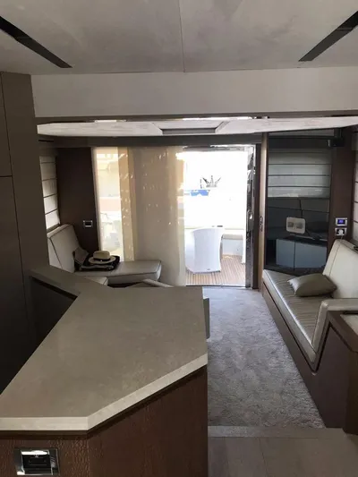  Yacht Photos Pics Luxurious interior of a 2014 Dominator 640 S yacht with modern seating and elegant design.