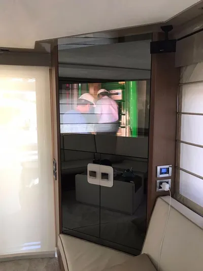  Yacht Photos Pics Interior of 2014 Dominator 640 S yacht with modern design and reflective surfaces.