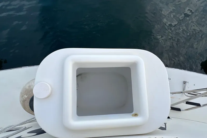 Adios Yacht Photos Pics White hatch on 1985 Tollycraft 48 Cockpit Motor Yacht, near water.