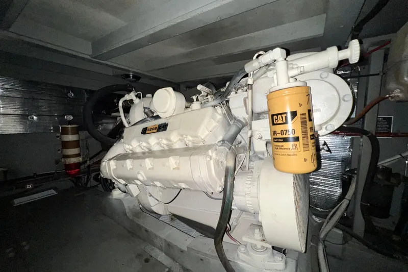 Adios Yacht Photos Pics Engine room of 1985 Tollycraft 48 Cockpit Motor Yacht with CAT 3208 engine.