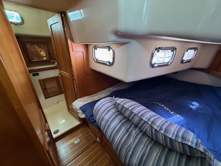 Chance Yacht Photos Pics 1999 Tartan 4100 yacht interior with cozy cabin and wooden finishes.
