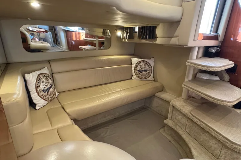 Solid Rock Yacht Photos Pics Luxurious interior of 2003 Sea Ray 380 Sundancer yacht with beige leather seating.