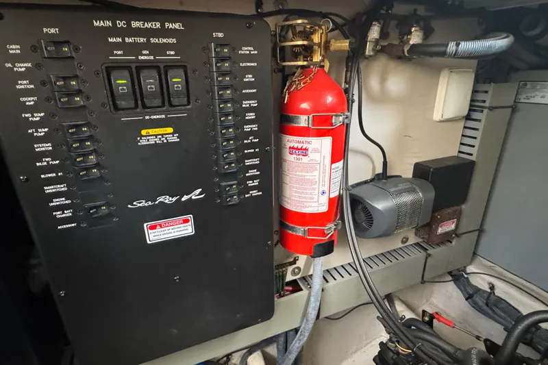 Solid Rock Yacht Photos Pics Main DC breaker panel and fire extinguisher in 2003 Sea Ray 380 Sundancer boat.
