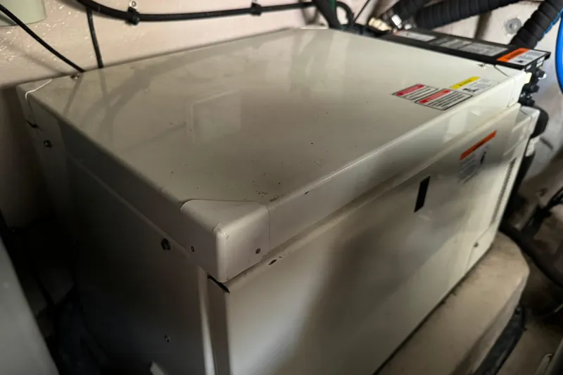 Solid Rock Yacht Photos Pics Engine compartment of a 2003 Sea Ray 380 Sundancer boat, showing equipment and wiring.