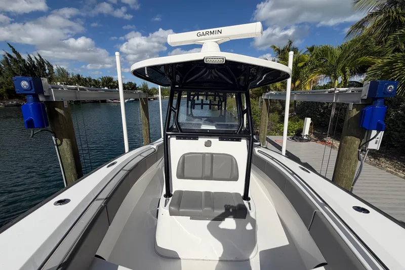  Yacht Photos Pics 2023 Cape Horn 32 XS boat docked, featuring Garmin equipment, under a clear blue sky.