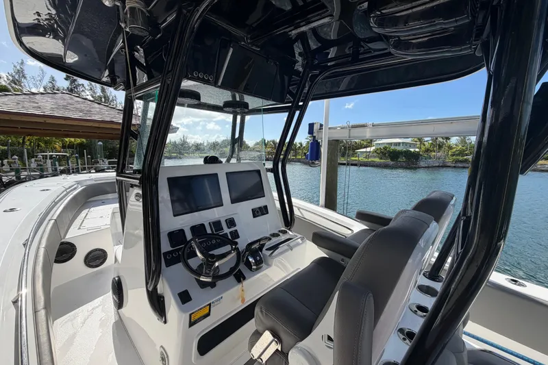  Yacht Photos Pics 2023 Cape Horn 32 XS boat cockpit with modern controls and dual screens.