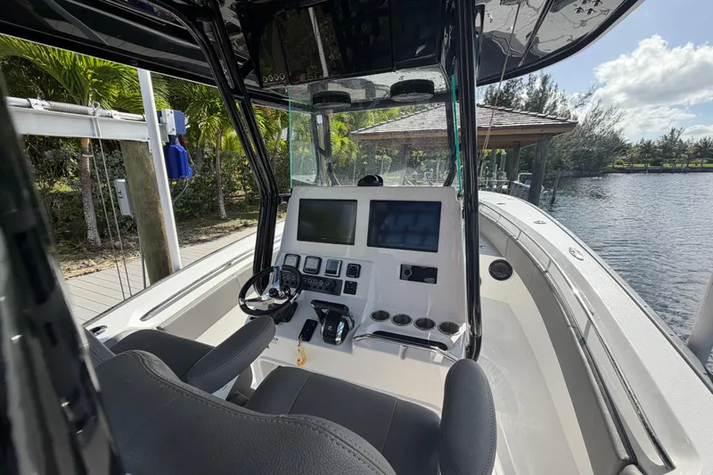  Yacht Photos Pics 2023 Cape Horn 32 XS boat cockpit with modern controls and steering wheel.