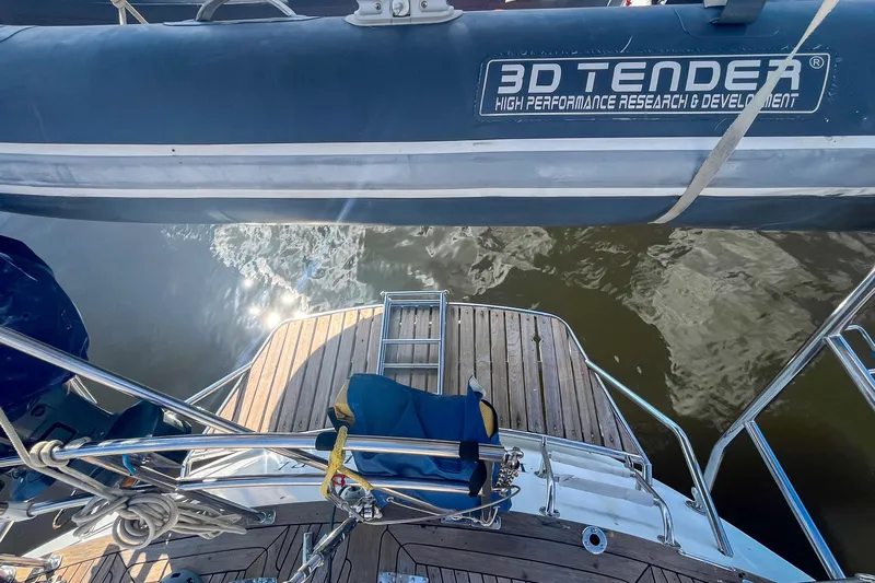 Pacific Pearl Yacht Photos Pics Deck view of 1991 Oyster LW48 yacht with 3D Tender inflatable boat.