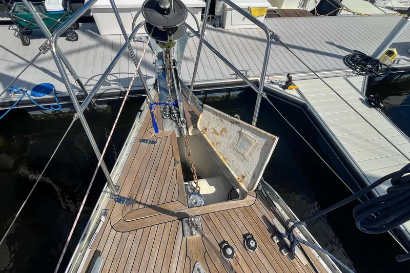 Pacific Pearl Yacht Photos Pics Bow of 1991 Oyster LW48 yacht with open anchor locker at marina.