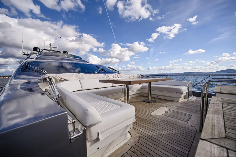  Yacht Photos Pics Luxurious 2007 Azimut 98 Leonardo yacht deck with elegant seating and ocean view.