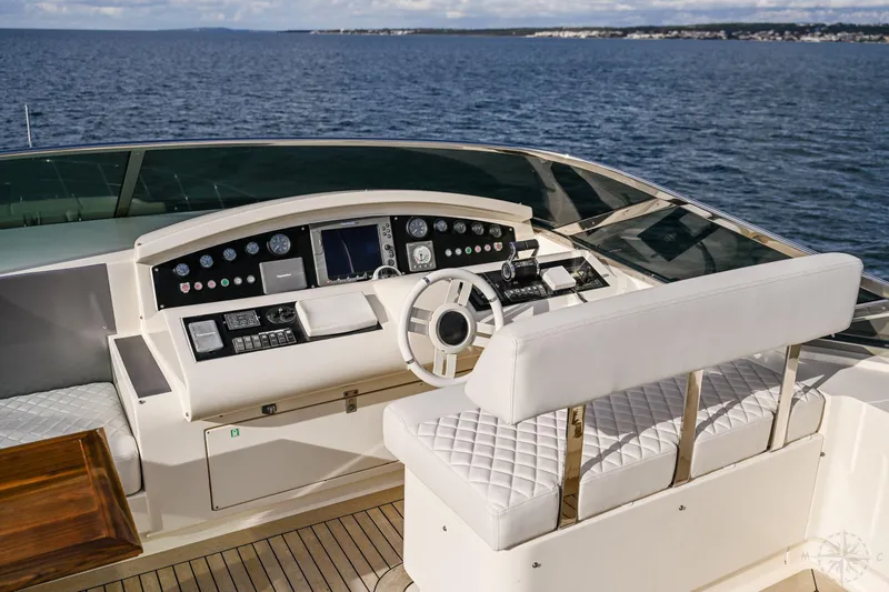  Yacht Photos Pics 2007 Azimut 98 Leonardo yacht helm with luxurious seating and ocean view.