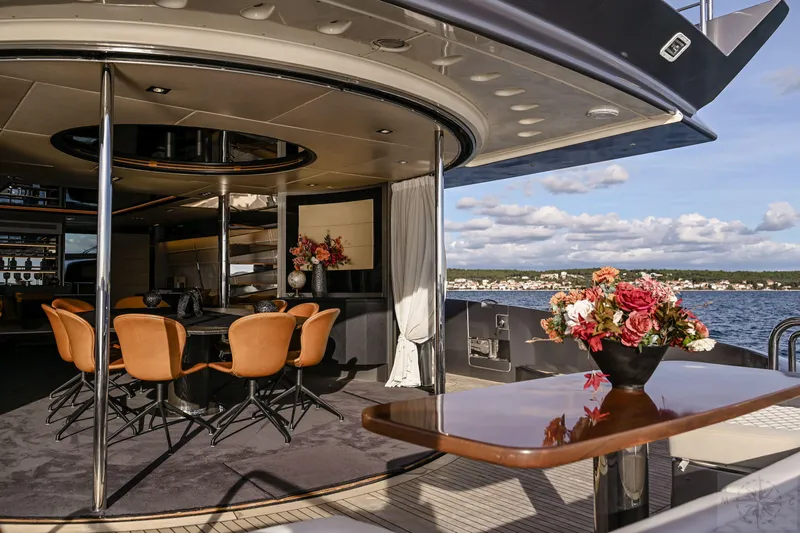  Yacht Photos Pics Luxurious 2007 Azimut 98 Leonardo yacht interior with elegant dining area and sea view.