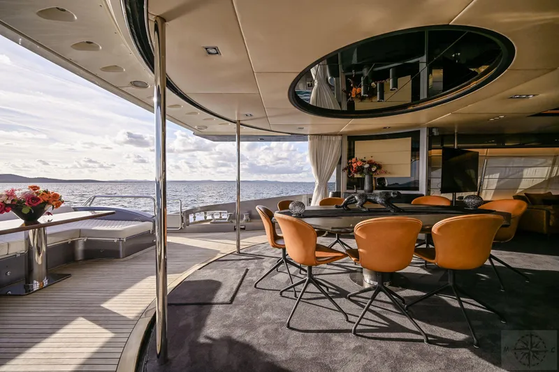  Yacht Photos Pics Luxurious interior of 2007 Azimut 98 Leonardo yacht with elegant seating and ocean view.