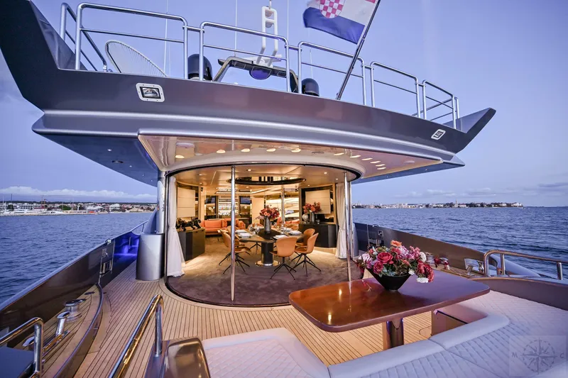  Yacht Photos Pics Luxurious 2007 Azimut 98 Leonardo yacht with elegant interior and scenic ocean view.