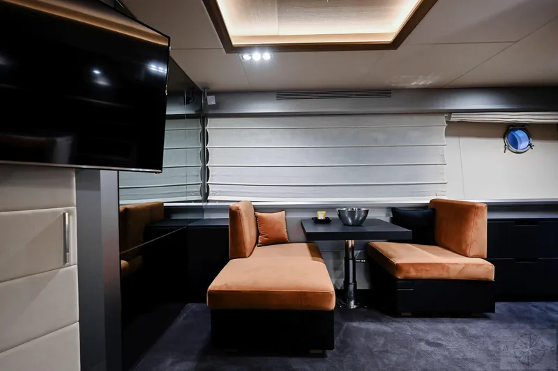  Yacht Photos Pics Luxurious interior of 2007 Azimut 98 Leonardo yacht with plush seating and modern decor.
