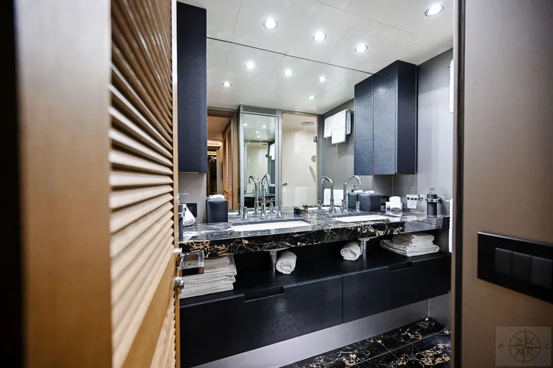  Yacht Photos Pics Luxurious bathroom interior of 2007 Azimut 98 Leonardo yacht with modern fixtures.