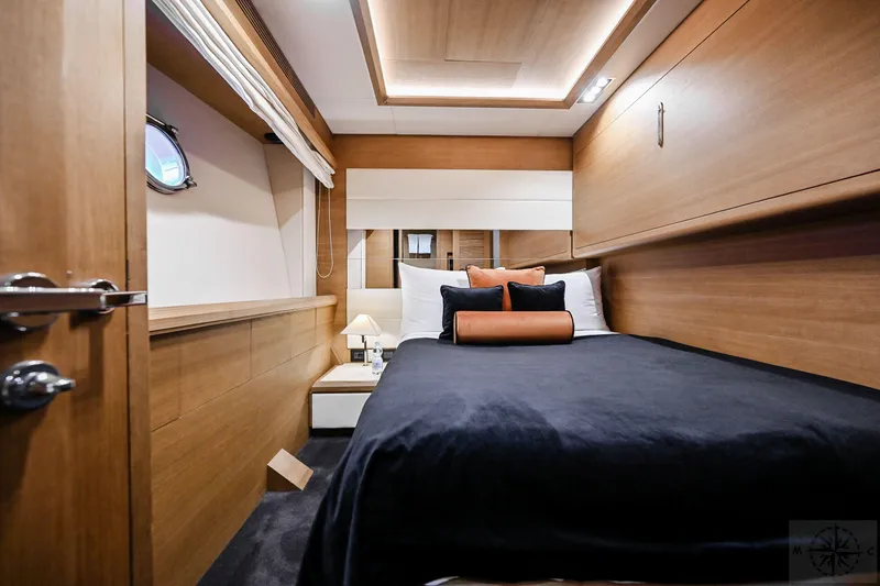  Yacht Photos Pics Luxurious cabin interior of 2007 Azimut 98 Leonardo yacht with modern wood finish.