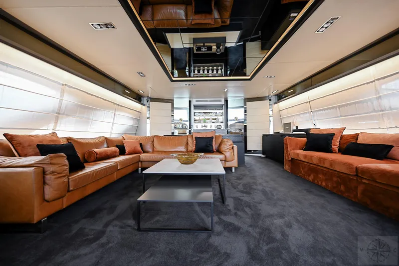  Yacht Photos Pics Luxurious interior of 2007 Azimut 98 Leonardo yacht with elegant leather seating and modern decor.