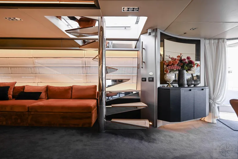  Yacht Photos Pics Luxurious interior of 2007 Azimut 98 Leonardo yacht with modern decor and spiral staircase.
