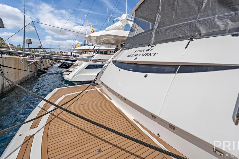  Yacht Photos Pics 2008 Sunseeker Manhattan 70 yacht docked, showcasing sleek design and spacious deck.